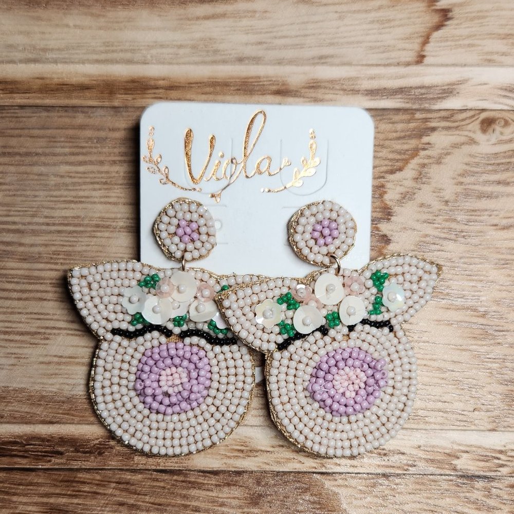 Viola beaded pig earrings